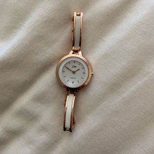 Rose gold and white quartz watch